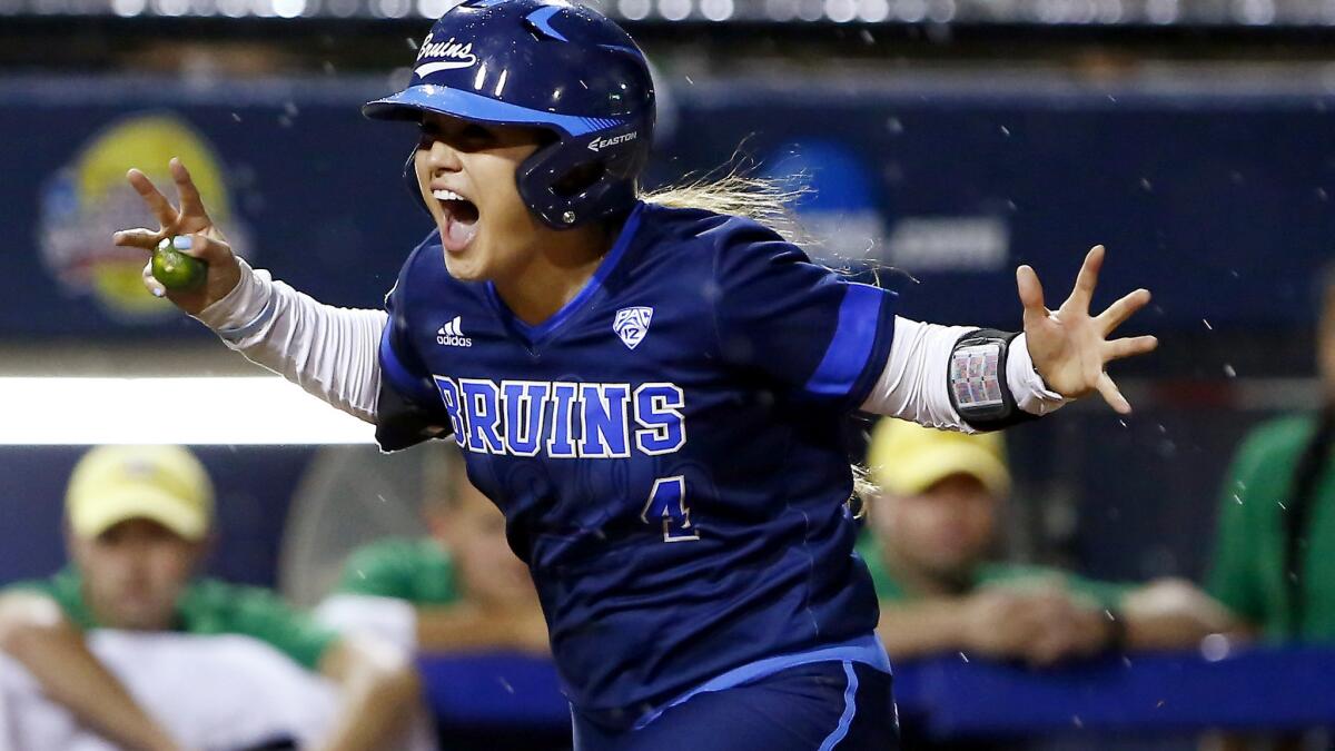 UCLA's Gabrielle Maurice celebrates on the way to home plate after hitting a home run in the second inning against Oregon on Thursday night.