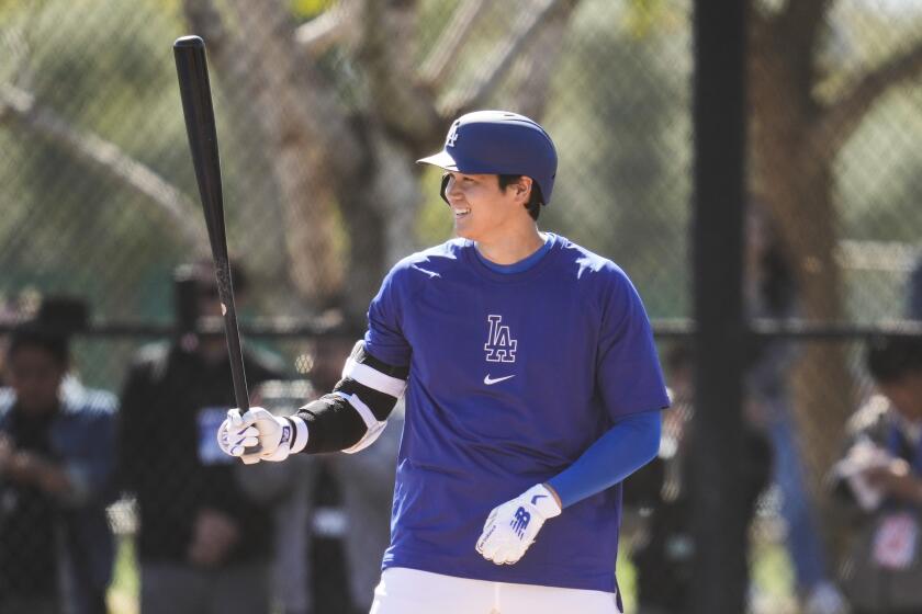 Dodgers designated hitter Shohei Ohtani participates in a spring training workout at Camelback Ranch in Phoenix Monday