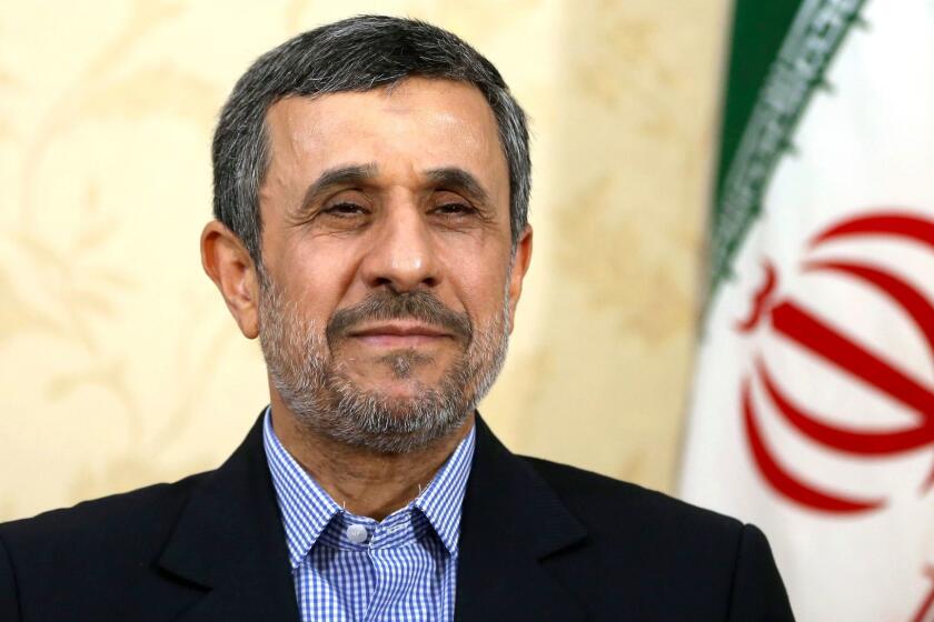 Former Iranian President Mahmoud Ahmadinejad gives an interview to The Associated Press at his office, in Tehran, Iran, Saturday, April 15, 2017. Former Iranian President Mahmoud Ahmadinejad says he does not view recent U.S. missile strikes on ally Syria as a message for Iran, which he called a "powerful country" that the U.S. cannot harm. (AP Photo/Ebrahim Noroozi)