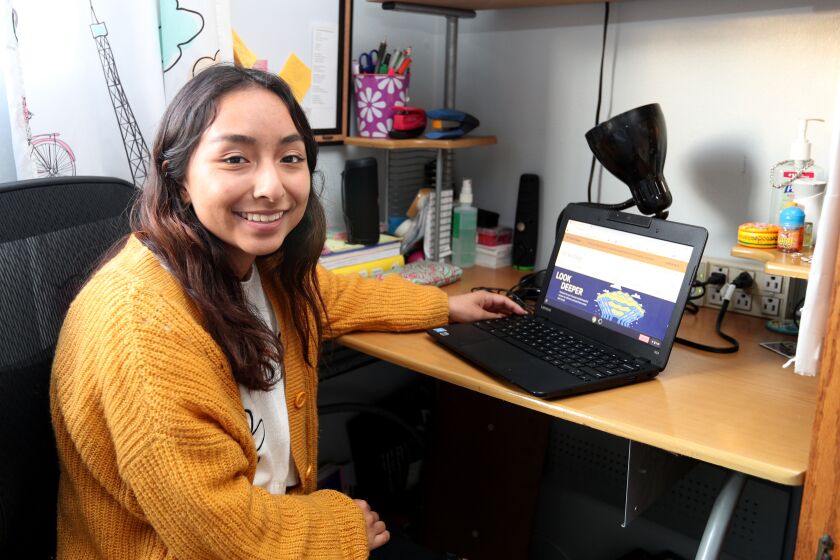 Paola Mendoza, who attends Costa Mesa's college prep school Early College, at her home in costa Mesa on Friday, June 12, 2020. Mendoza was awarded a full scholarship to UC San Diego and has earned enough college credits to start college at UCSD as a second-semester sophomore.