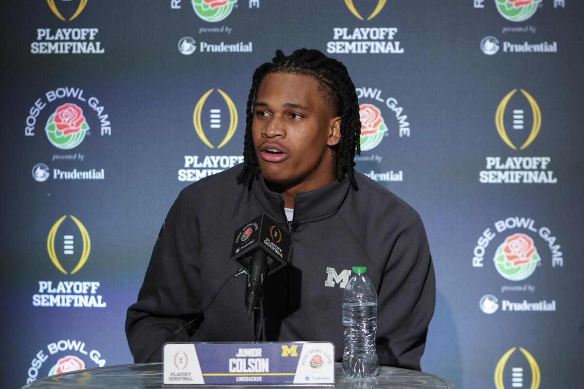 Michigan linebacker Junior Colson speaks to reporters during a Rose Bowl news conference 