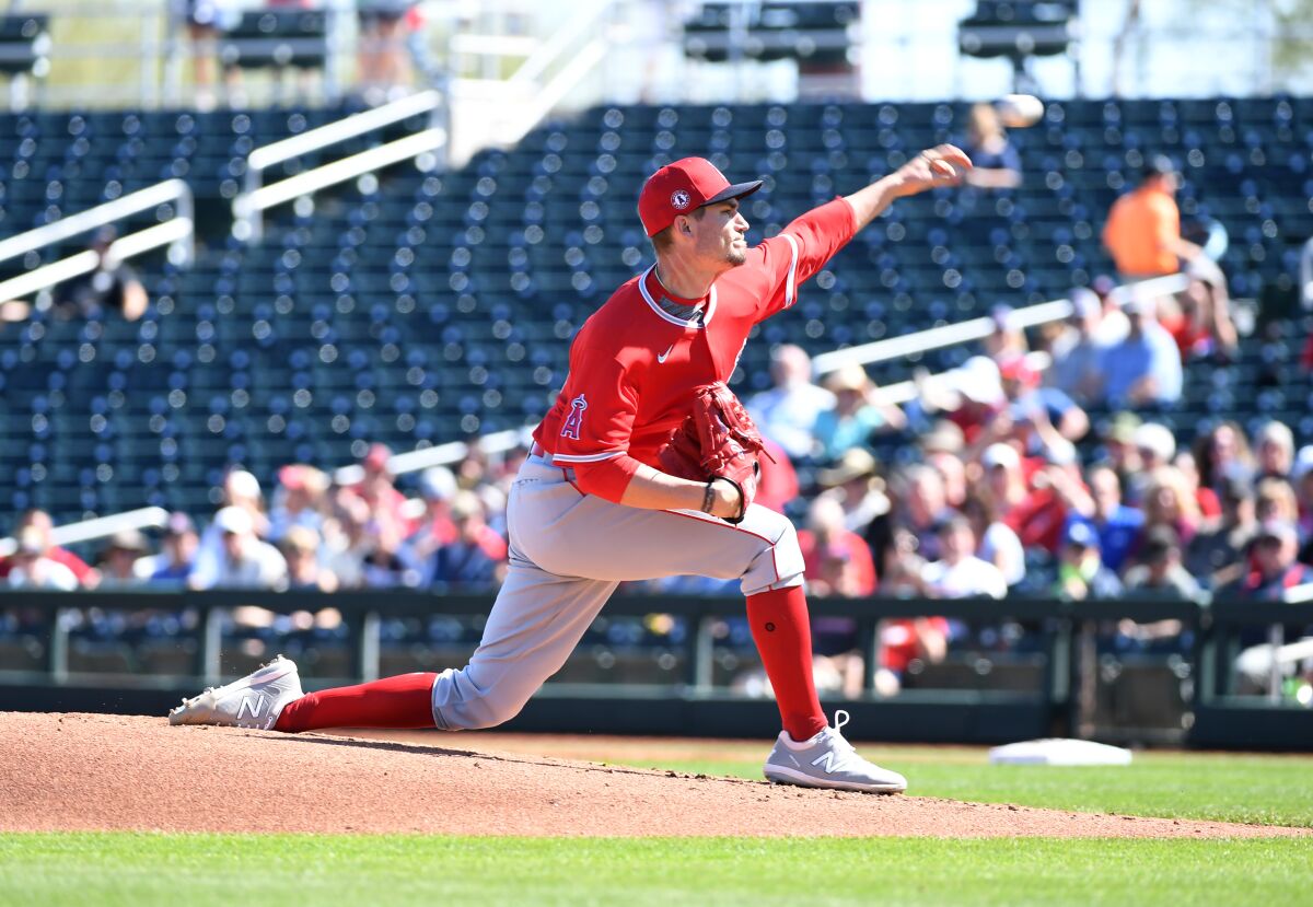 Angels starting pitcher Andrew Heaney delivers during a spring training game against the Cleveland Indians on Tuesday.