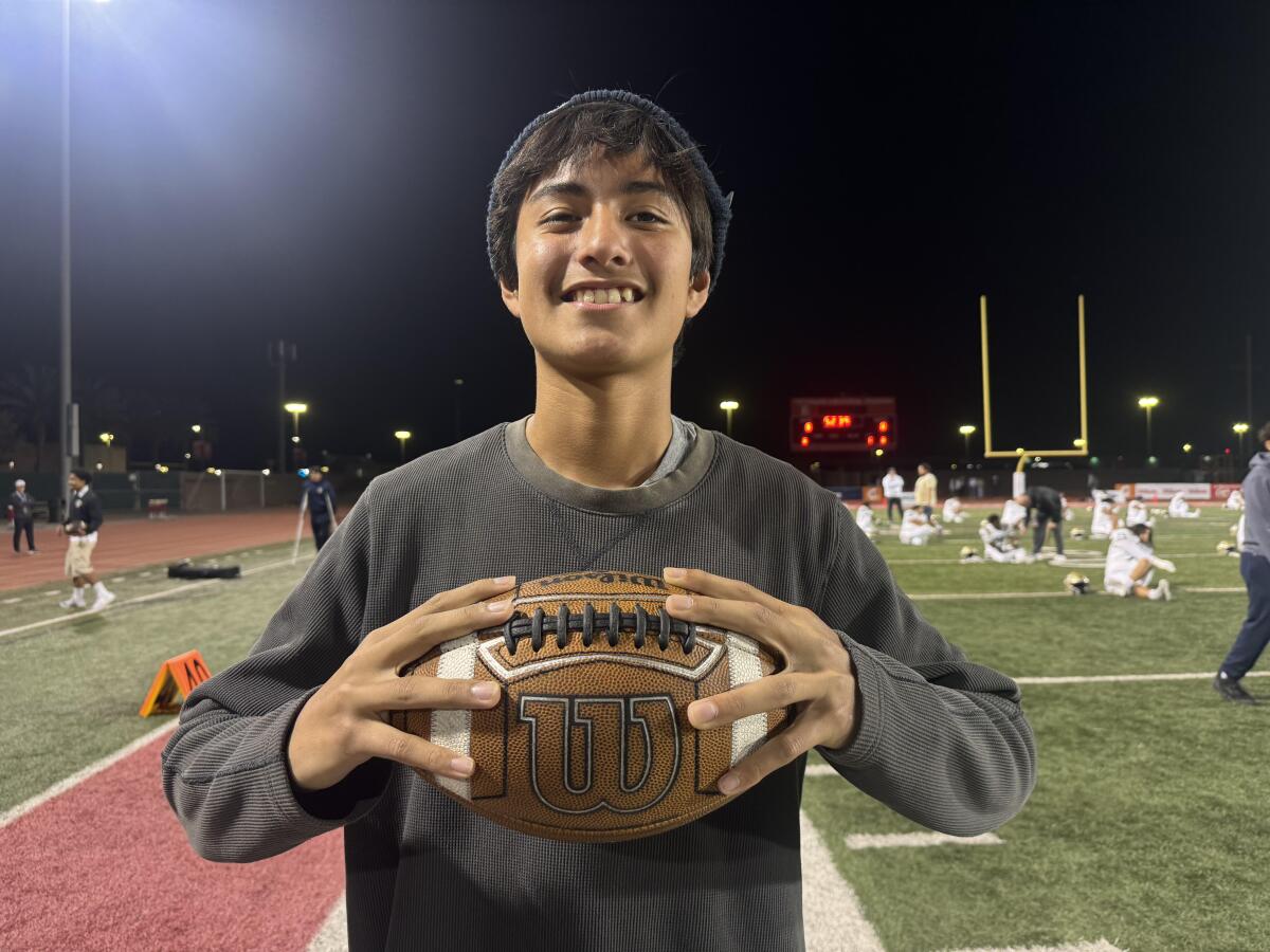 Serving as St. John Bosco's ball boy is 12-year-old Ryu Sanchez, brother of former Braves quarterback Caleb Sanchez.