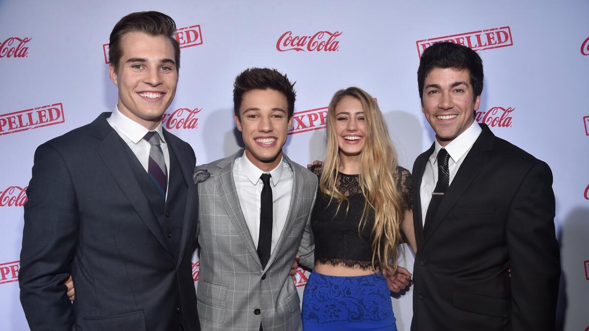 From left, actors Marcus Johns, Cameron Dallas, Lia Marie Johnson and director Alex Goyette attend the premiere of Awesomeness TV's "EXPELLED" in Los Angeles.