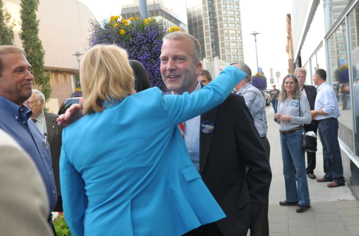 Dan Sullivan, who won the Republican primary in the race for a U.S. Senate seat in Alaska, greets a supporter in Anchorage.