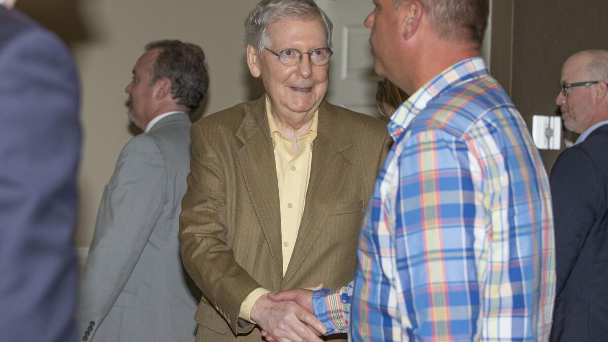 U.S. Senate Majority Leader Mitch McConnell greets attendees at a luncheon in Paducah, Ky., on Tuesday.