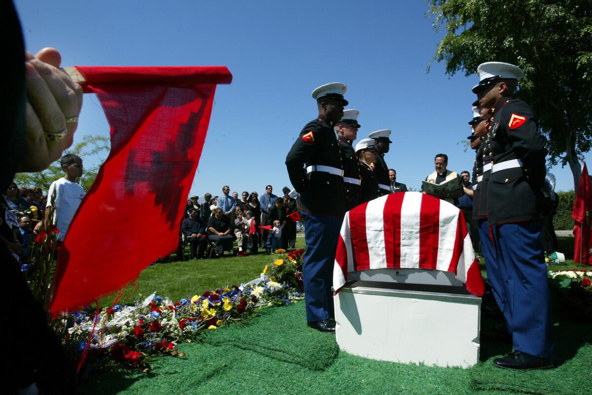 Lance Cpl. Jesus Gonzalez's casket is flanked by fellow Marines at his burial in Indio on April 23, 2003.