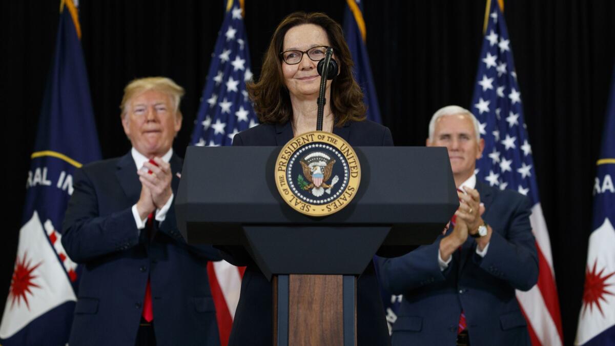President Trump and Vice President Mike Pence applaud incoming CIA Director Gina Haspel.