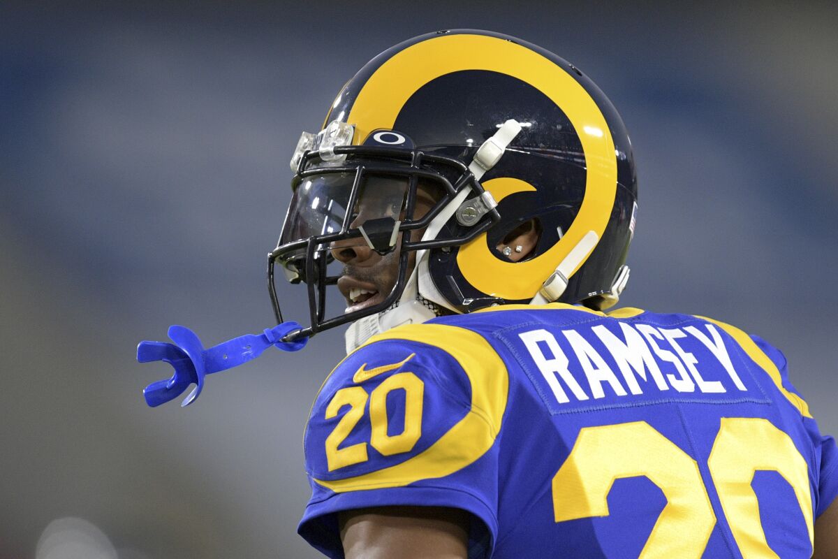 FILE - In this Dec. 8, 2019, file photo, Los Angeles Rams cornerback Jalen Ramsey watches during an NFL football game against the Seattle Seahawks in Los Angeles. Ramsey remains confident he will sign a new contract with the Rams as he heads into the final season of his rookie deal. (AP Photo/Kyusung Gong, File)