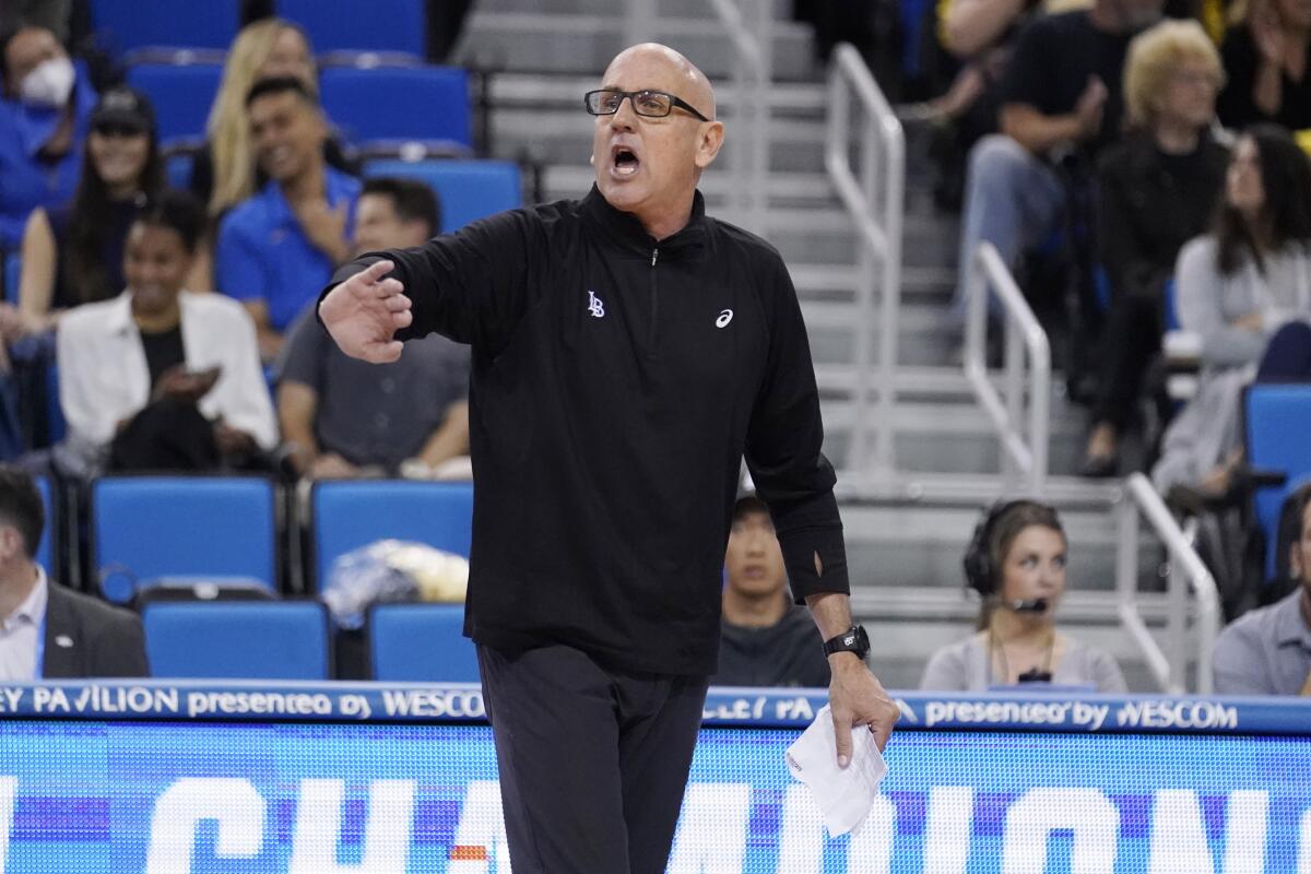 Long Beach State coach Alan Knipe talks to the team during an NCAA men's volleyball tournament  against UCLA in 2022.