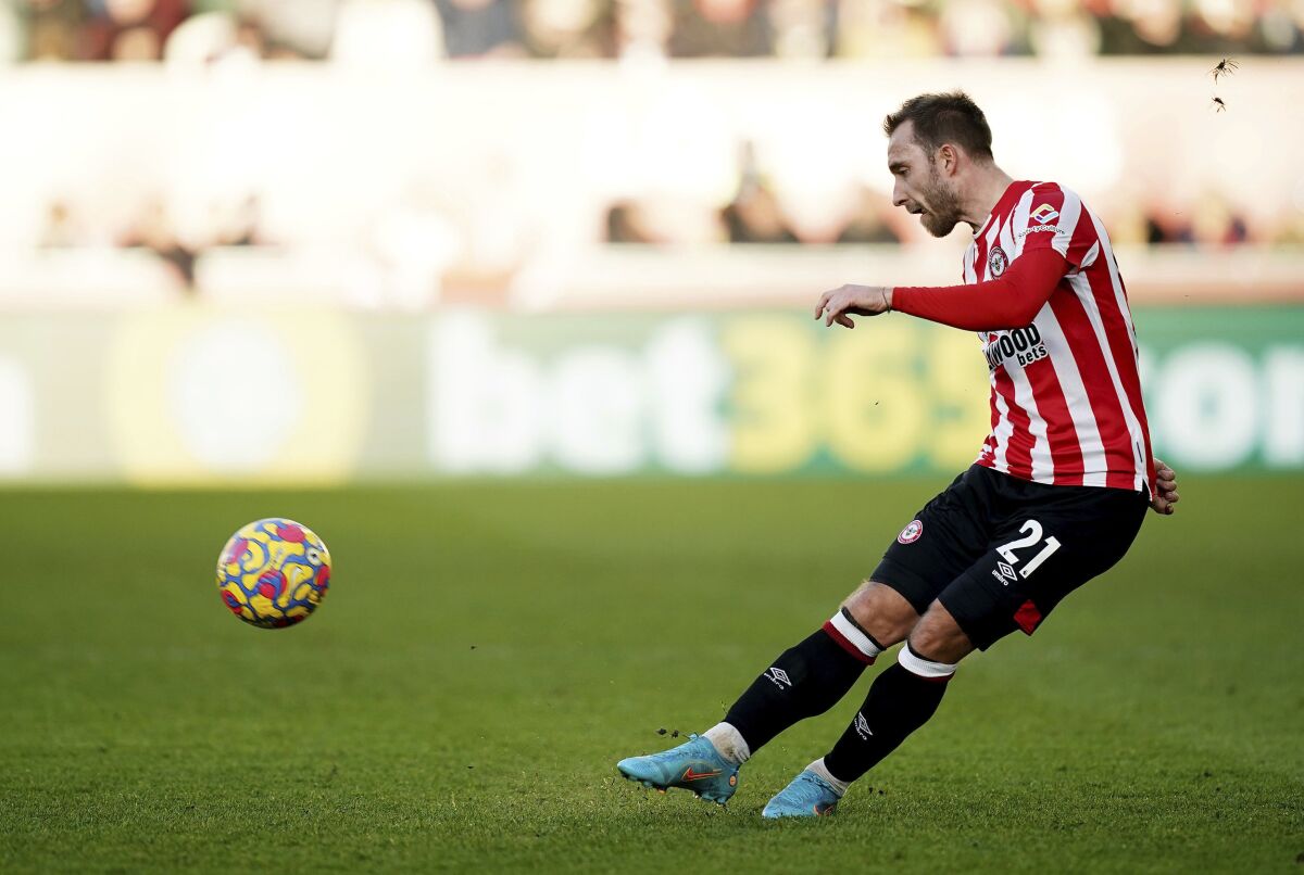 Brentford's Christian Eriksen in action, during the English Premier League soccer match between Brentford and Newcastle United at the Brentford Community Stadium, London, Saturday Feb. 26, 2022. (Aaron Chown/PA via AP)