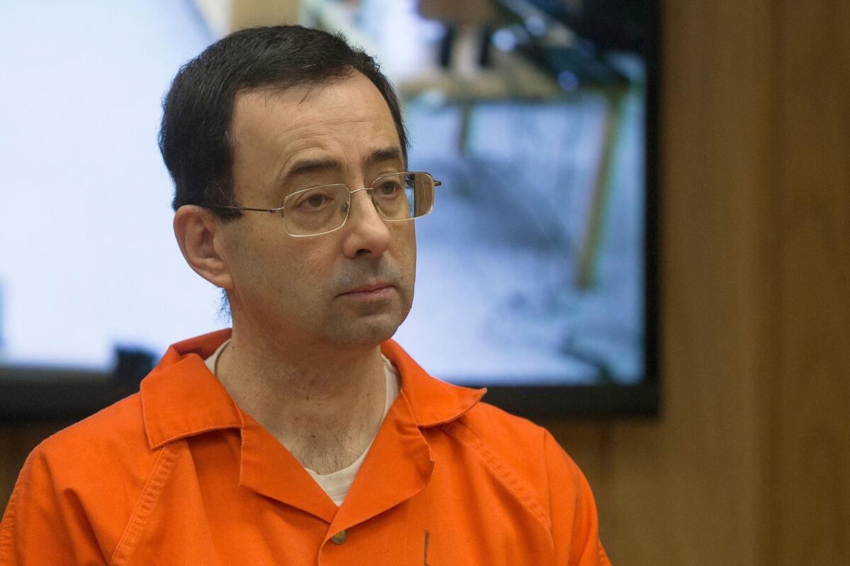 Former Michigan State University and USA Gymnastics doctor Larry Nassar appears in court for his final sentencing phase in Eaton County Circuit Court in Charlotte, Mich., on Feb. 5, 2018.