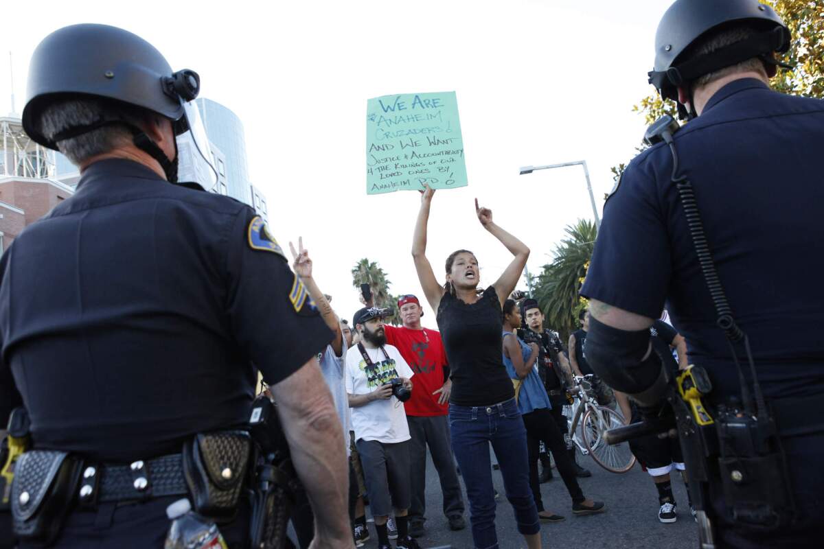 Protesters gathered outside of Anaheim City Hall to protest police killings July 24, 2012.