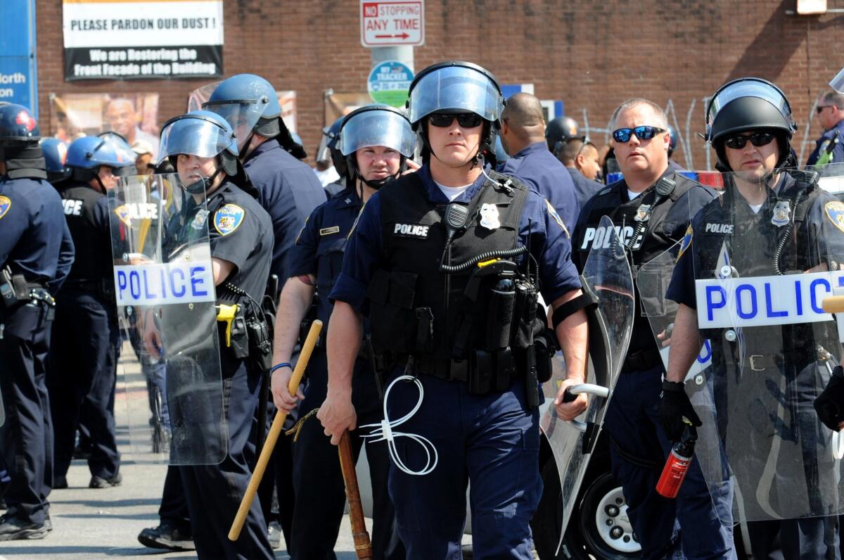 Police guard an intersection in Baltimore on May 4.
