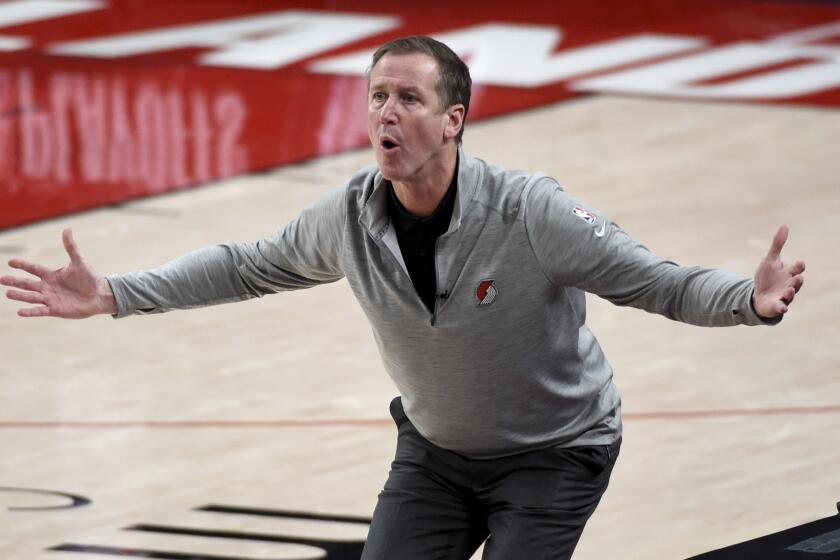 Portland Trail Blazers head coach Terry Stotts reacts to an official's call during the first half of Game 4.