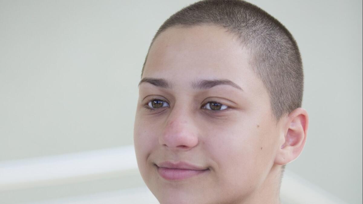 Emma Gonzalez pauses during an interview June 4 in Parkland, Fla. A day after graduating from high school, a group of Florida school shooting survivors announced a multistate bus tour to “get young people educated, registered and motivated to vote.”