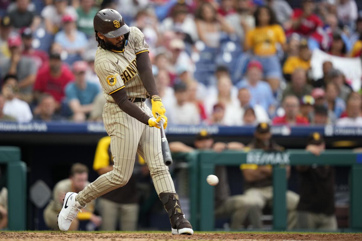 Padres' Fernando Tatis Jr. homers in IL return again, makes first  appearance in outfield