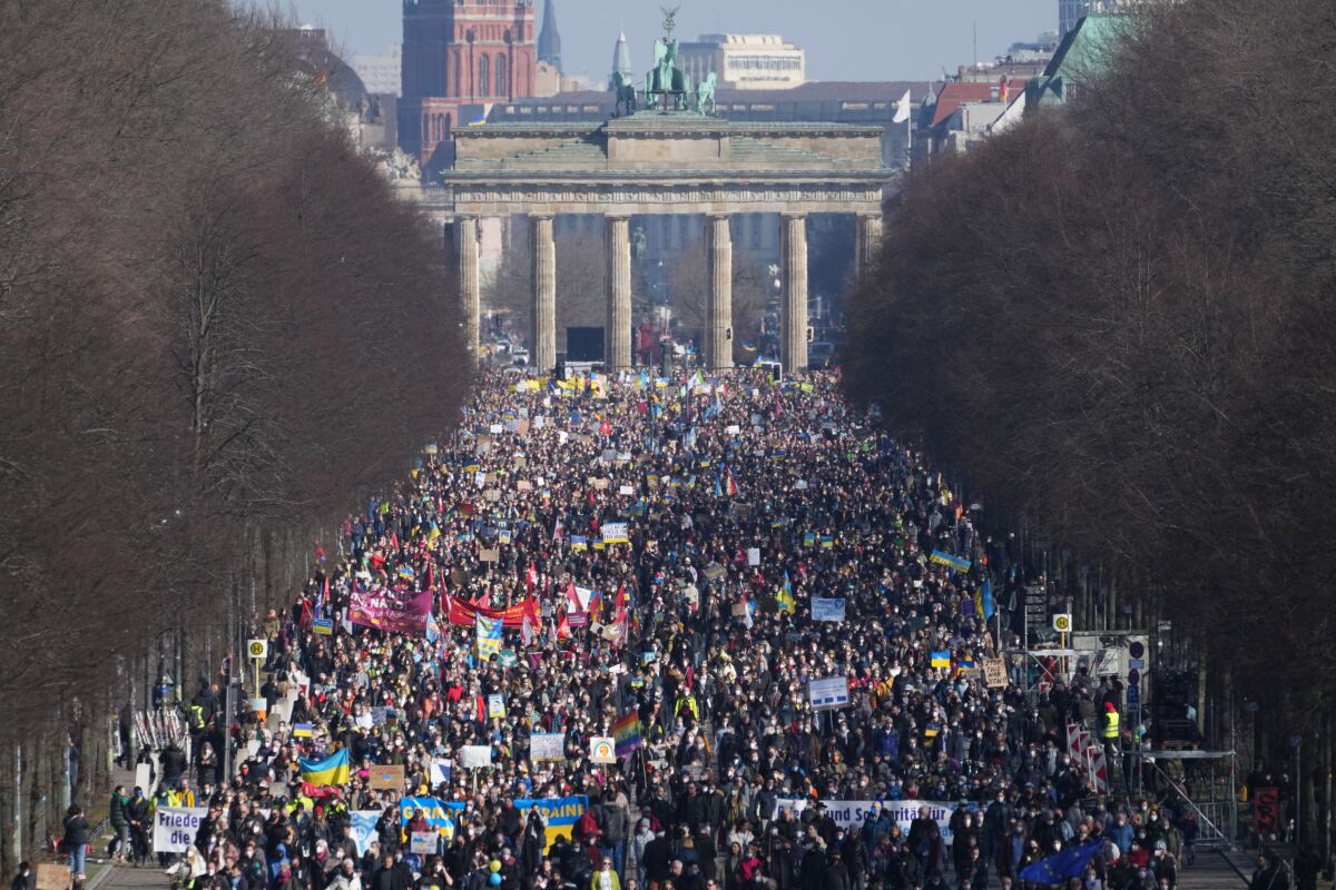 People take part in a demonstration against the war in Ukraine in Berlin, Germany.