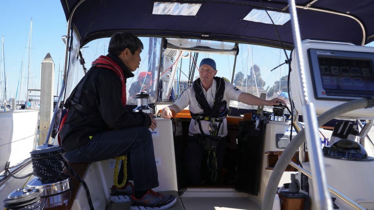On board the Dream Weaver, blind sailor Mitsuhiro "Hiro" Iwamoto of San Diego, left, and Doug Smith are planning a two-month nonstop voyage to Japan.