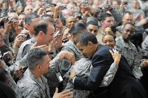 President Barack Obama greets troops at Camp Victory, just outside Baghdad. He made a surprise visit to Iraq after his overseas trip which included the G-20 economic summit.