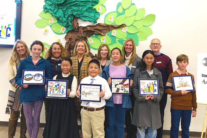 The SBSD board with the poster contest winners.