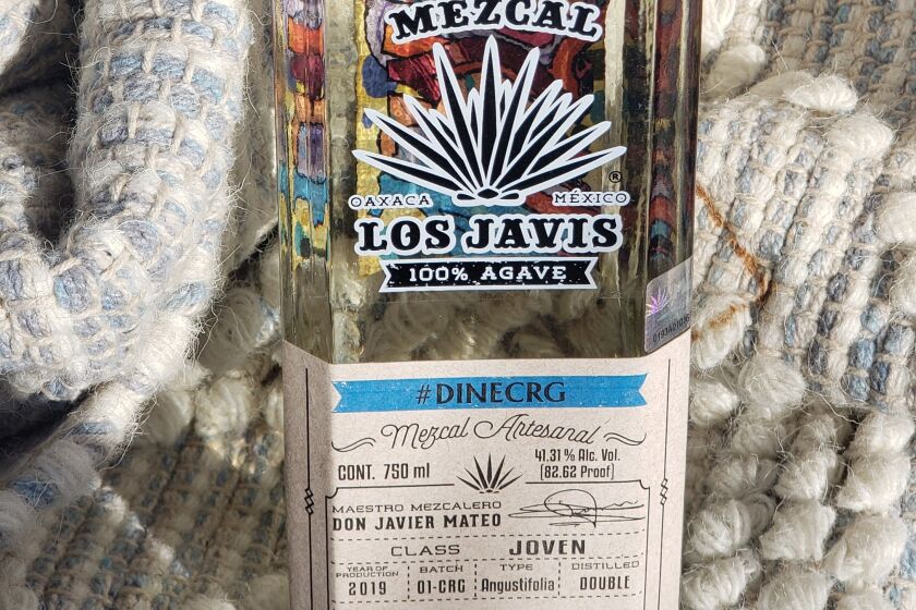 The Los Javis #DINECRG proprietary mezcal was created after a trip to the Oaxaca producer's facility by Cohn Restaurant Group beverage director Maurice DiMarino and eight of the group's bar managers. And it wasn't all sipping and no work, DiMarino said. They learned the laborious process of making mezcal firsthand, including harvesting, crushing and distilling agave with traditional tools. “The team went to the agave fields and spent an afternoon harvesting,” DiMarino said. "It is backbreaking work. We then hiked to the mountains in search of wild agave, which can be difficult to find but adds so much depth and distinction to the flavor, I really wanted some for our exclusive mezcal.” The next day, on the Los Javis ranch, the San Diegans prepared the agave for fermentation in the traditional way, from breaking it down with a machete to crushing it with a horse drawn “tahona,” thecustomary stone wheel used by the mezcaleros, or mezcal crafters.