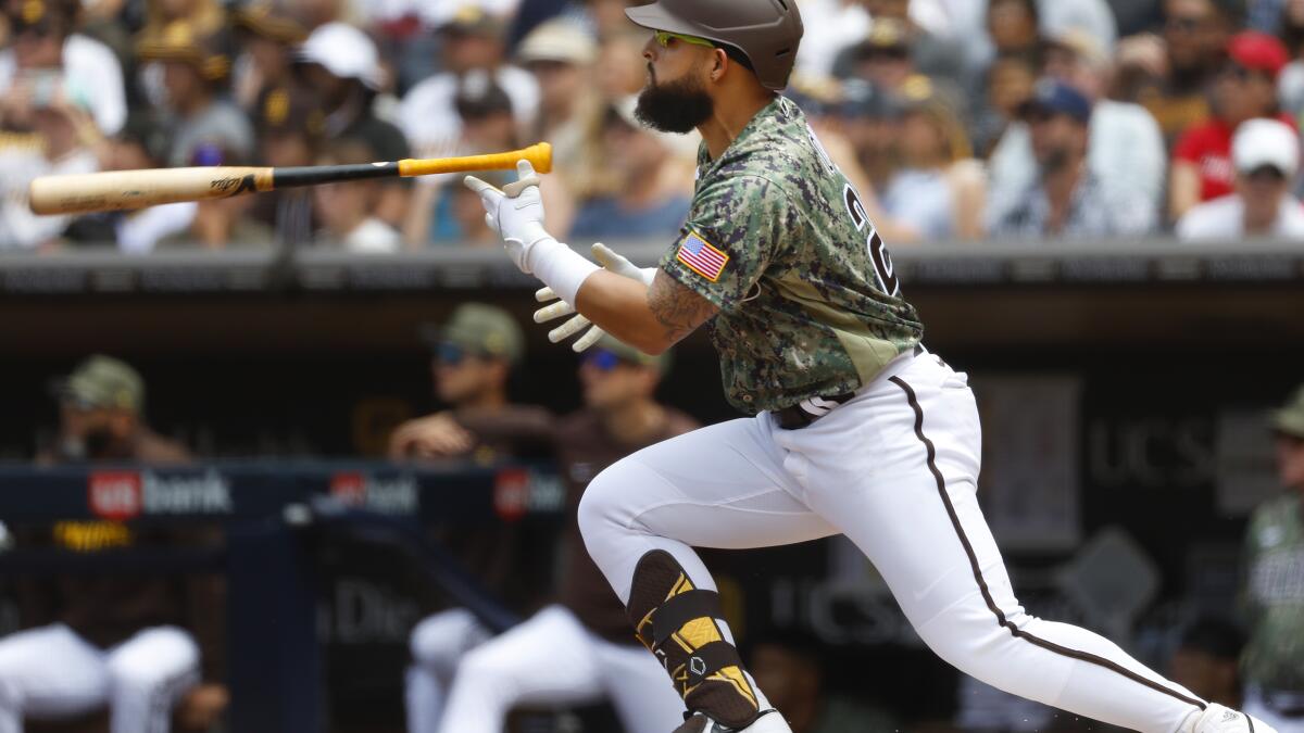 Rougned Odor of the San Diego Padres walks back to the dugout