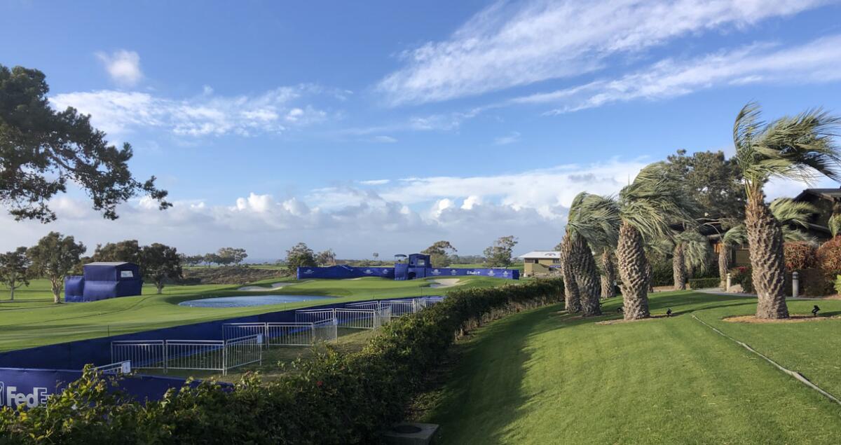 The high winds Monday that bent trees and toppled TV towers led to closure of the Torrey Pines Golf Course.