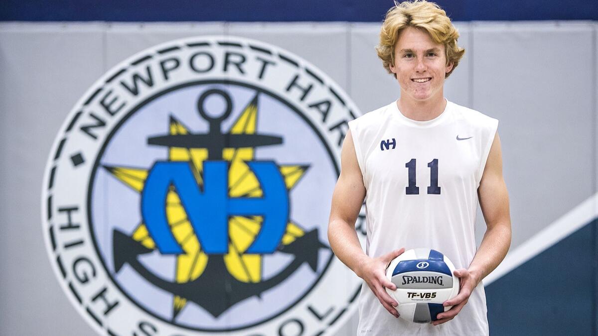 Jack Higgs of Newport Harbor High boys' volleyball had 14 kills and three aces as the Sailors beat rival CdM 25-18, 25-20, 26-24 in the Battle of the Bay match on April 7.