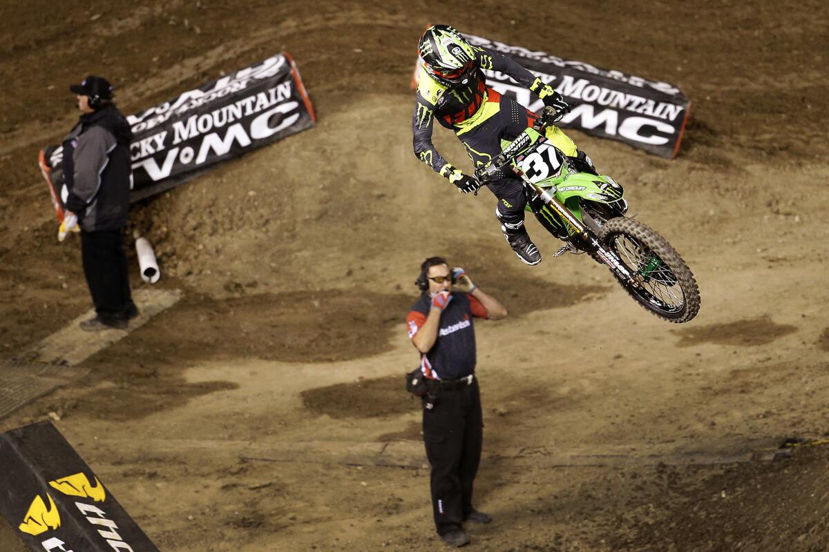A rider makes his way around the course during a qualifying race at the Monster Energy AMA Supercross at Angel Stadium on Jan. 23.