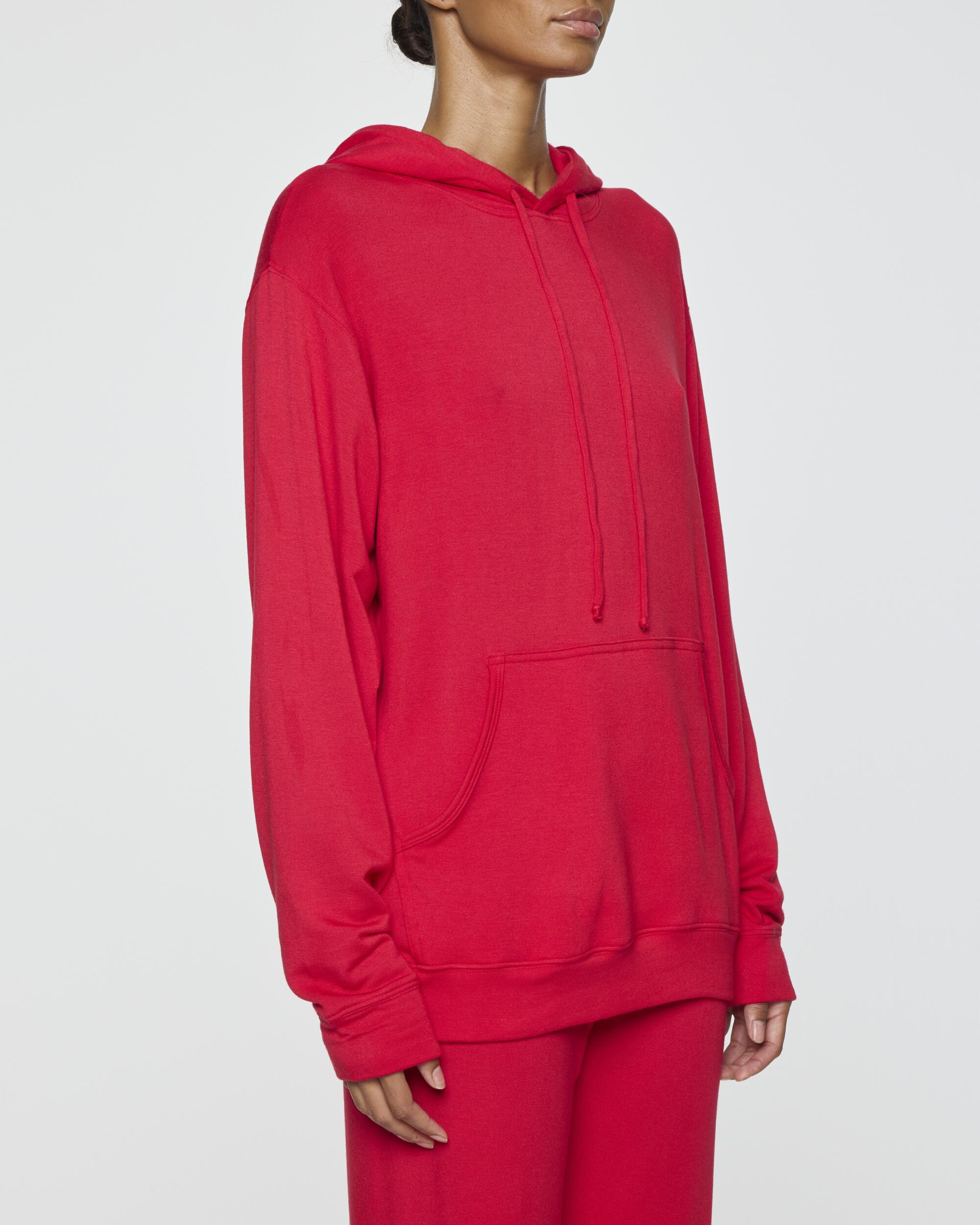 A woman in a red hoodie 