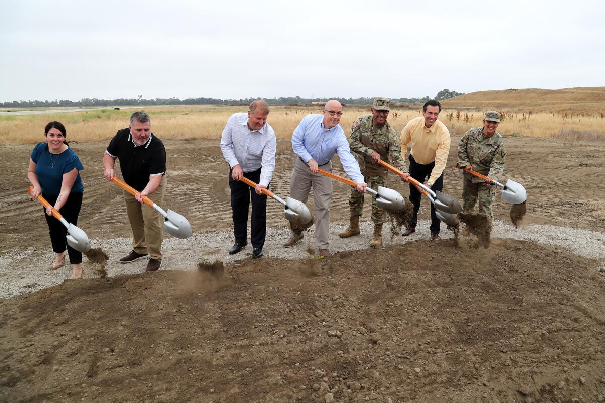 Honored guests participate in a groundbreaking at Los Alamitos at Joint Forces Training Base on May 19.