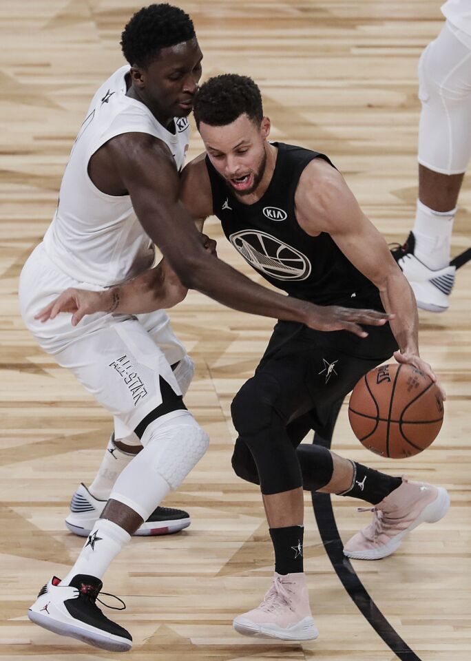 Stephen Curry, Victor Oladipo