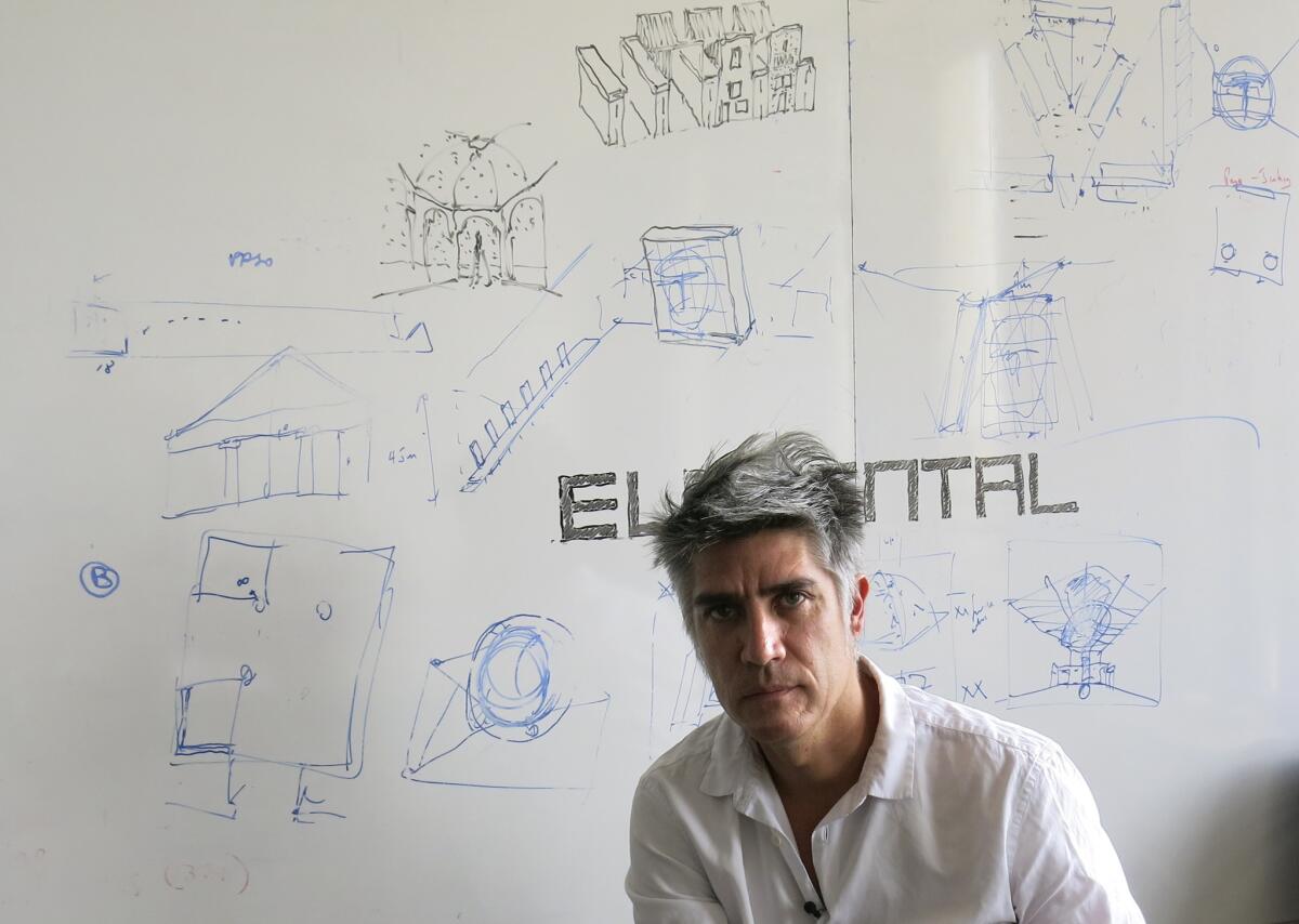Chilean architect Alejandro Aravena poses for a photo at his studio in Santiago, Chile, in January, upon being named the recipient of the Pritzker Prize.