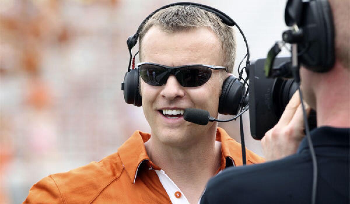 Bryan Harsin, shown giving an interview as Texas' co-offensive coordinator in 2011, will take over as head coach at Arkansas State.