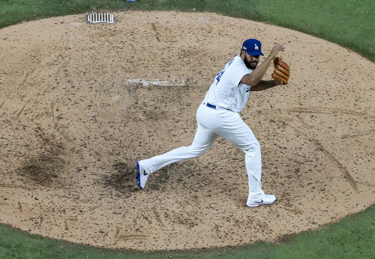 Dodgers relief pitcher Kenley Jansen delivers a pitch during the ninth inning of a 3-1 win over the Atlanta Braves.