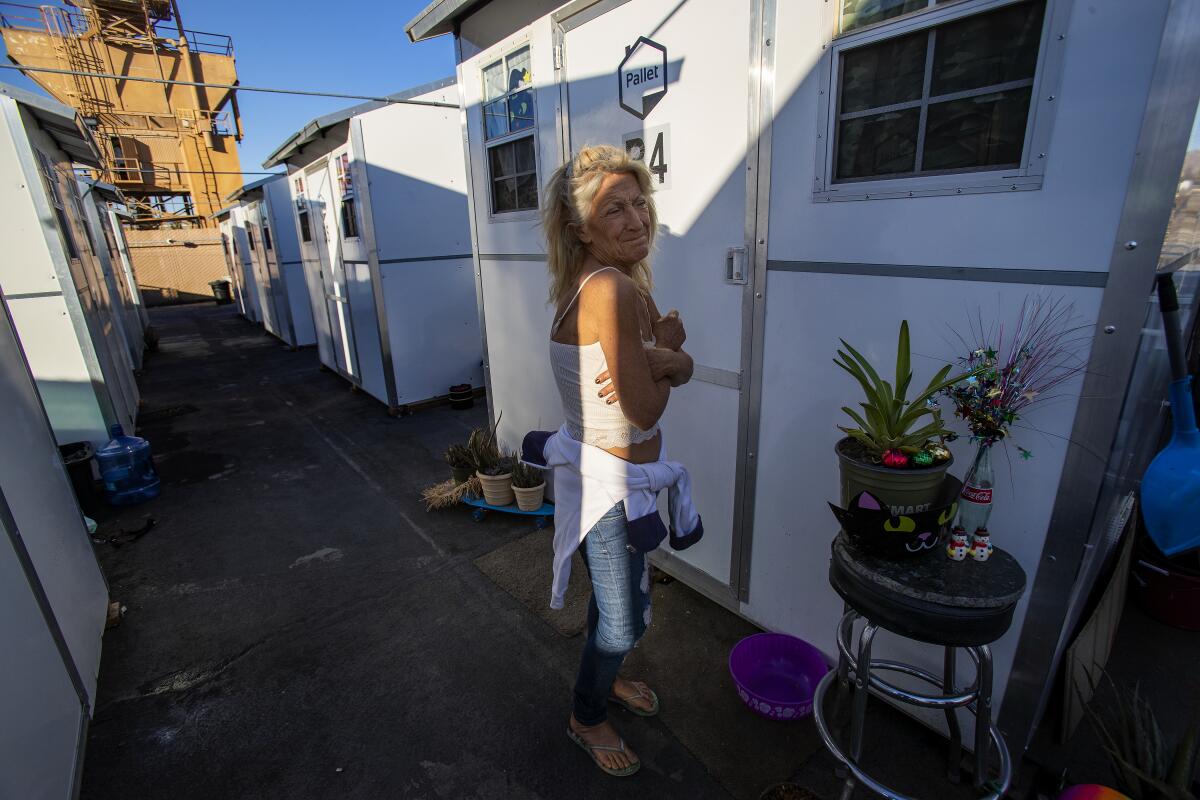 Karen Morea outside her tiny home in Riverside.