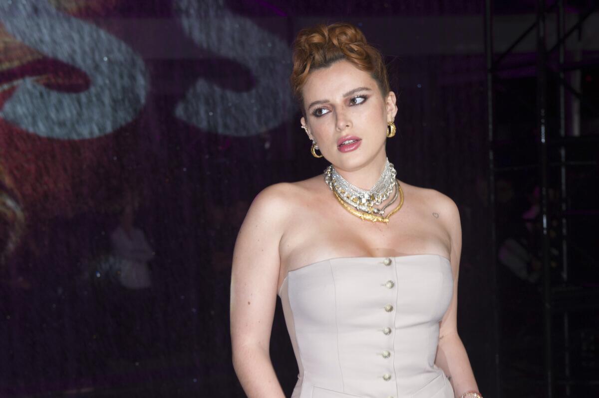 Bella Thorne poses in a corseted top