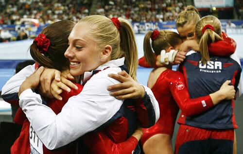 The only time the U.S. women won a team gold medal in the Olympics was at the home-country Atlanta Games of 1996 (Kerri Strug, anyone?). The team's only world championship medal came in 2003 in friendly Anaheim. On Wednesday, for only the second time at the world championships, the Americans were graced with a team gold medal on the distant shore of Stuttgart, Germany, defeating the defending champion Chinese team by a slim margin of 184.400 to 183.450. Romania finished third. Shayla Worley, left, and Samantha Peszek indulge in a victory hug, one of only many.