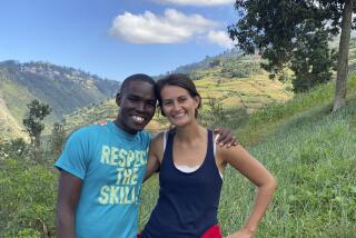 In this undated photo provided by El Roi Haiti, Alix Dorsainvil, right, poses with her husband, Sandro Dorsainvil. Alix Dorsainvil, a nurse for El Roi Haiti, and her daughter were kidnapped on Thursday, July 27, the organization said. (Courtesy of El Roi Haiti via AP)