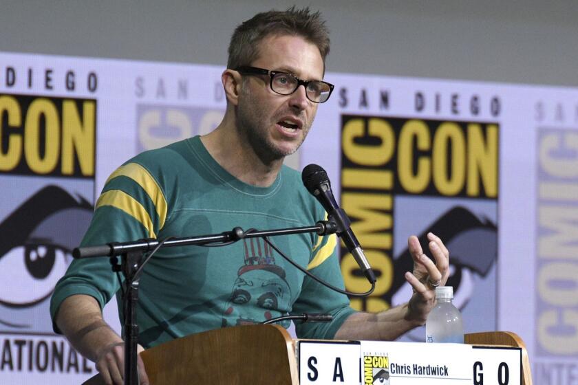 FILE - In this July 21, 2017 file photo, Chris Hardwick moderates the "Fear The Walking Dead" panel at Comic-Con International in San Diego. Hardwick, a mainstay at Comic-Con and moderator of numerous panels, stepped aside from moderating AMC and BBC America panels amid allegations from an ex-girlfriend, which Hardwick has denied. (Photo by Al Powers/Invision/AP, File)