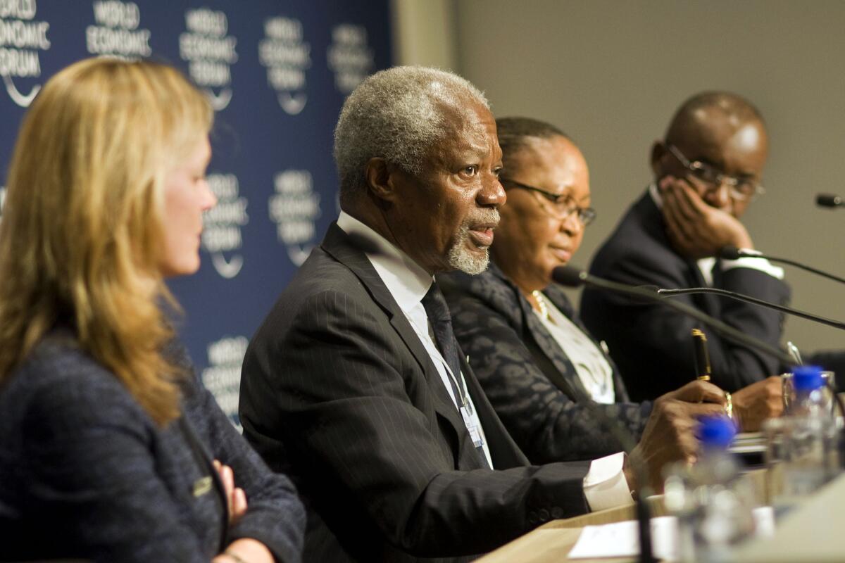 Head of the Africa Progress Panel and former U.N. Secretary-General Kofi Annan, second from the left, speaks during a news conference at the World Economic Forum Meeting on Africa in Cape Town.