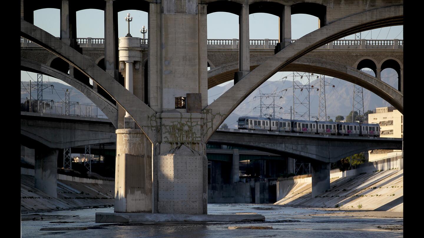 A Metro Line train crosses over the L.A. River.