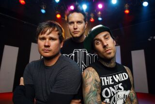 San Diego band blink-182 from left, Tom DeLonge, Mark Hoppus and Travis Barker are shown here in a Los Angeles studio on Thursday, June 4, 2009. (Photo by K.C. Alfred / San Diego Union-Tribune)