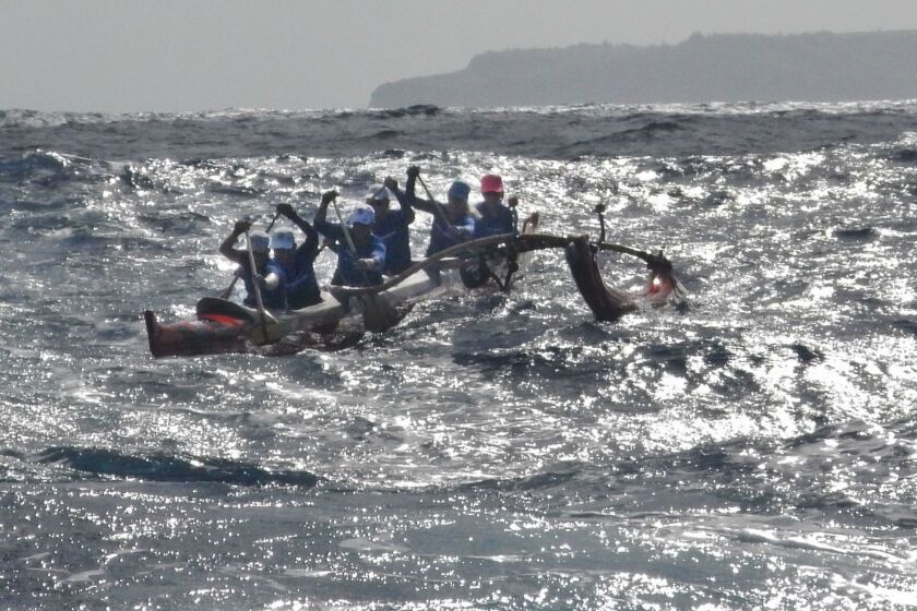 The SoCal Wahines catch a wave in the Pailolo Channel about six miles into the race. Outrigger canoe teams competed last month in the ninth annual Pailolo Challenge, a 28-mile race from Maui to Molokai that’s sponsored by the Hawaiian Canoe Club.