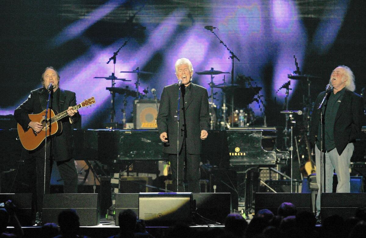 From left, Stephen Stills, Graham Nash and David Crosby perform at the Musicares Person of the Year Tribute to Neil Young at the Los Angeles Convention Center in 2010.