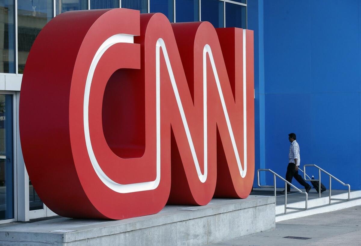 A man walks into the CNN Center in Atlanta on Aug. 26.