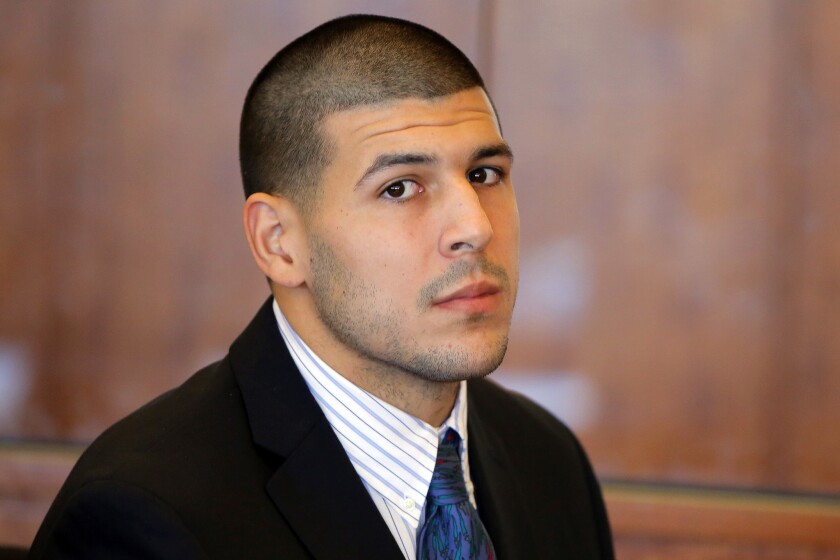 Former New England Patriots tight end Aaron Hernandez attends a court hearing Oct. 9, 2013, in Fall River, Mass. He died in 2017, at age 27.