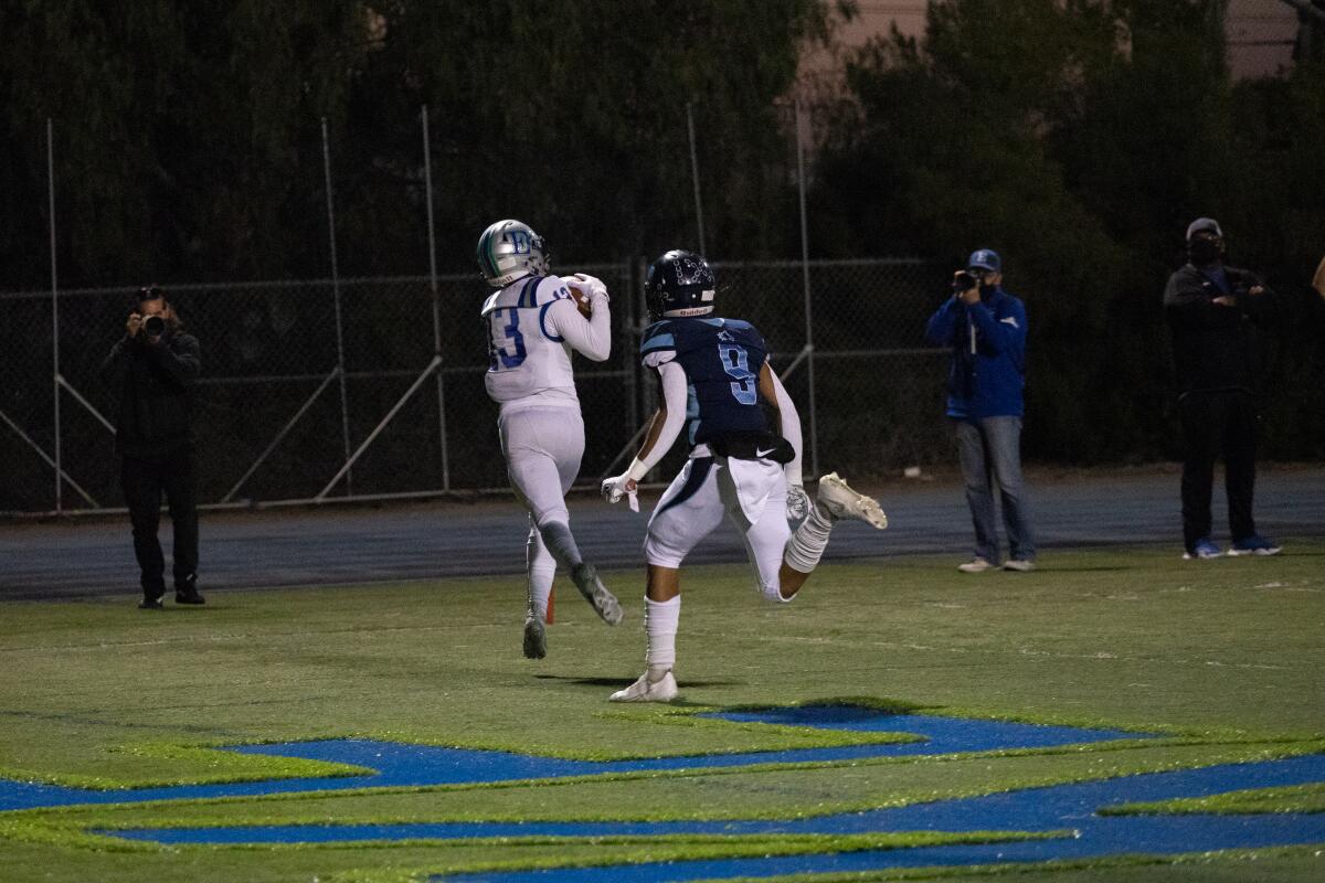 Eastlake receiver Jordan Blondin catches a 24-yard TD pass during the second half of Friday night’s game against Otay Ranch.