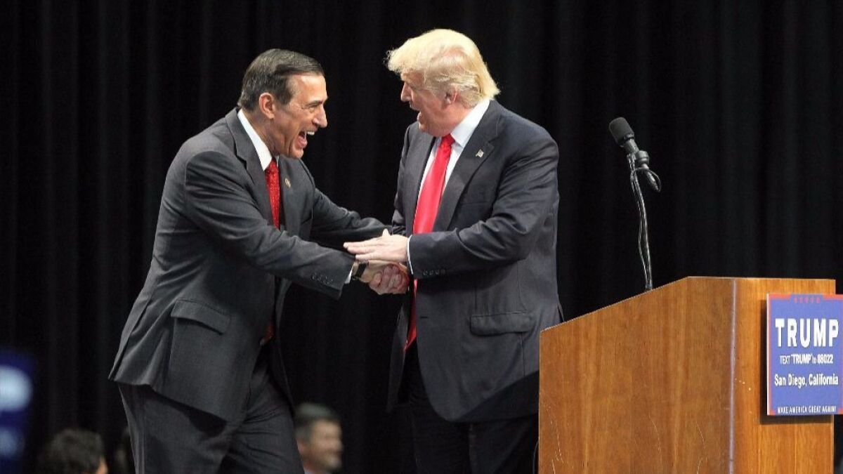 Then-Rep. Darrell Issa greets then candidate Donald J. Trump at an event in San Diego in 2016.